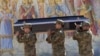 Ukraine -- Soldiers carry the coffin of their comrade, a Ukrainian military officer killed during fighting against Russians, during his funeral at St Michael cathedral in Kyiv, Ukraine, Thursday, Sept. 8, 2022. 