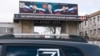  A billboard, depicting Head of Chechnya Ramzan Kadyrov, Urkaine