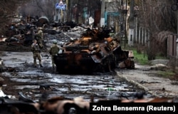 Одна из улиц Бучи после освобождения города от оккупации. 2 апреля 2022 года. Фото: Reuters