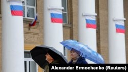 Мелитопольцы в оккупированном Россией городе. Ноябрь 2022 года. Фото: Reuters