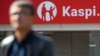 KAZAKHSTAN -- The Kaspi Bank logo in seen at the bank's branch in Almaty, October 7, 2019