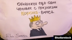 Карикатура Елкина с Путиным на одном из самодельных плакатов во время протестов в Петербурге