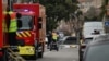 A demining robot of Marseille Naval Fire Battalion (Marins-Pompiers de Marseille) arrives in front of the Russian consulate in Marseille, after three improvised explosive devices were thrown, on February 24, 2025.